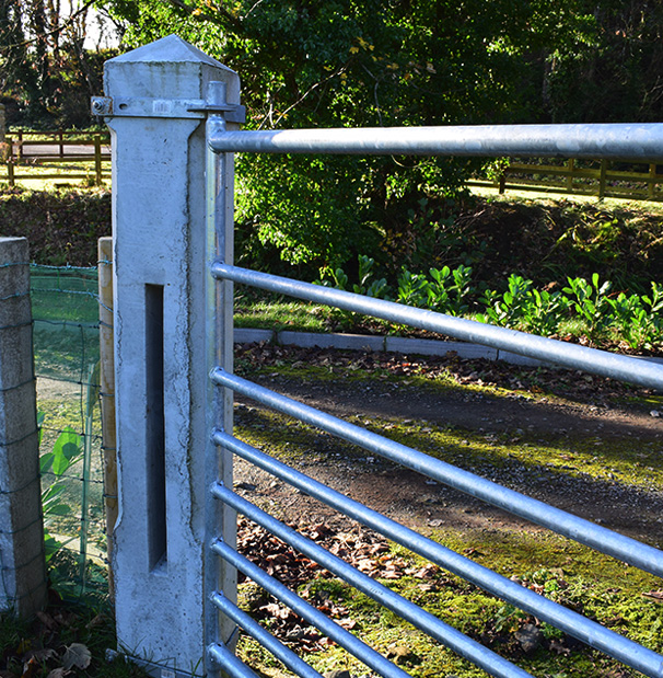 9x9 decorative gate post with 6x6 fencing strainer
